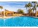 Relaxing outdoor pool with lounge chairs and shaded seating at 3582 N 160Th Ave, Goodyear, AZ 85395