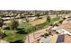 Aerial view of a golf course and houses nearby at 3582 N 160Th Ave, Goodyear, AZ 85395