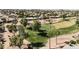 Aerial view of a golf course and houses nearby at 3582 N 160Th Ave, Goodyear, AZ 85395