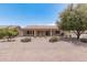 Backyard view of home with desert landscaping at 3582 N 160Th Ave, Goodyear, AZ 85395