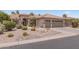 House exterior with two-car garage and desert landscaping at 3582 N 160Th Ave, Goodyear, AZ 85395