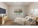 Bedroom with neutral decor and large window at 3582 N 160Th Ave, Goodyear, AZ 85395