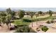 Aerial view of a house near a golf course with mountain views at 3582 N 160Th Ave, Goodyear, AZ 85395