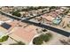 Aerial view of houses with solar panels and a street at 3582 N 160Th Ave, Goodyear, AZ 85395