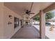 Covered patio with ceiling fan and backyard access at 3582 N 160Th Ave, Goodyear, AZ 85395