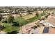 Aerial view of a golf course and houses nearby at 3582 N 160Th Ave, Goodyear, AZ 85395