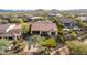 Aerial view of house with solar panels and backyard at 17506 E Desert Vista Trl, Rio Verde, AZ 85263