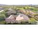 Aerial view of house with solar panels and pool at 17506 E Desert Vista Trl, Rio Verde, AZ 85263