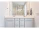 Clean bathroom with double sinks and large mirror at 453 E Wiley Way, Casa Grande, AZ 85122