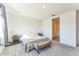 Bright and airy main bedroom with a king bed and ensuite bathroom at 453 E Wiley Way, Casa Grande, AZ 85122