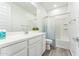 Clean bathroom with white vanity, tub, and shower at 453 E Wiley Way, Casa Grande, AZ 85122