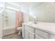 Clean bathroom with white vanity and tub at 453 E Wiley Way, Casa Grande, AZ 85122