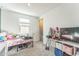 bedroom with pink walls and twin bed at 453 E Wiley Way, Casa Grande, AZ 85122