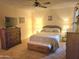 Spacious bedroom with a queen-size bed and ample closet space at 11634 N Rio Vista Dr, Sun City, AZ 85351