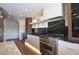 Sleek kitchen featuring a professional range and marble countertops at 8049 E Via Sierra --, Scottsdale, AZ 85258