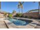 Refreshing kidney-shaped pool surrounded by a gravel patio at 3291 E Latham Way, Gilbert, AZ 85297