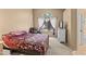 Spacious bedroom with a comfortable bed and plenty of room for furniture at 1018 W Juniper Ave, Gilbert, AZ 85233