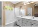 Main bathroom with double sinks, tub and shower at 1018 W Juniper Ave, Gilbert, AZ 85233