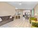 Open concept living and dining area with kitchen views at 1018 W Juniper Ave, Gilbert, AZ 85233