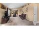 Living room with two recliners and view of dining area at 1018 W Juniper Ave, Gilbert, AZ 85233