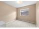 Simple bedroom with carpet, window and closet at 1018 W Juniper Ave, Gilbert, AZ 85233
