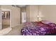 Spacious bedroom with carpet flooring and walk-in closet at 1018 W Juniper Ave, Gilbert, AZ 85233
