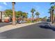 Community parking lot with covered parking spots at 14950 W Mountain View Blvd # 1105, Surprise, AZ 85374
