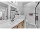 Updated bathroom with quartz countertop and walk-in shower at 14950 W Mountain View Blvd # 1105, Surprise, AZ 85374