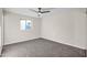 Bright bedroom with carpet flooring and ceiling fan at 8319 E Palm Ln, Scottsdale, AZ 85257