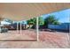 Spacious backyard with patio, landscaping, and a fire pit at 8319 E Palm Ln, Scottsdale, AZ 85257