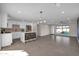 Modern kitchen with white cabinets and an island at 8319 E Palm Ln, Scottsdale, AZ 85257