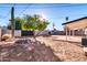 Large backyard with a patio and desert landscaping at 8319 E Palm Ln, Scottsdale, AZ 85257
