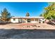 Backyard view showing home's exterior and patio at 8319 E Palm Ln, Scottsdale, AZ 85257
