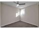 Bright bedroom with ceiling fan and neutral walls at 8319 E Palm Ln, Scottsdale, AZ 85257