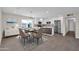 Kitchen and dining area with glass dining table at 8319 E Palm Ln, Scottsdale, AZ 85257