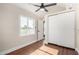 Charming bedroom with wood floors and a spacious closet at 1921 E Yale St, Phoenix, AZ 85006