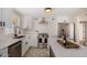 Newly remodeled kitchen with white cabinets, quartz countertops, and stainless steel appliances at 1921 E Yale St, Phoenix, AZ 85006