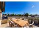 Relaxing rooftop deck with outdoor dining furniture at 1921 E Yale St, Phoenix, AZ 85006