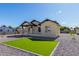 Updated craftsman bungalow with artificial turf and gravel at 1921 E Yale St, Phoenix, AZ 85006