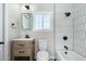 Modern bathroom with hexagon tile and updated vanity at 1921 E Yale St, Phoenix, AZ 85006