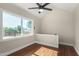 Simple bedroom with hardwood floors and ceiling fan at 1921 E Yale St, Phoenix, AZ 85006