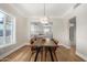 Dining room with hardwood floors and view of kitchen at 1921 E Yale St, Phoenix, AZ 85006