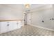 White cabinets and wood countertop in this laundry room at 1921 E Yale St, Phoenix, AZ 85006