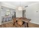 Open dining area with wood table and view of the kitchen at 1921 E Yale St, Phoenix, AZ 85006