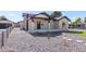 Renovated craftsman home with a rock walkway and landscaping at 1921 E Yale St, Phoenix, AZ 85006