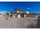 House exterior and backyard with gravel landscaping at 1921 E Yale St, Phoenix, AZ 85006