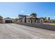 Newly renovated home with a detached garage and block wall at 1921 E Yale St, Phoenix, AZ 85006