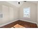 Bright bedroom with wood floors and a large window at 1921 E Yale St, Phoenix, AZ 85006
