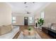 Living room with hardwood floors, fireplace and view of front entry at 1921 E Yale St, Phoenix, AZ 85006