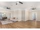 Open living room with hardwood floors and access to other rooms at 1921 E Yale St, Phoenix, AZ 85006